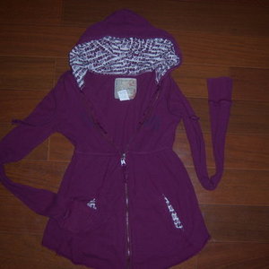 Small hooded zipper sweater is being swapped online for free