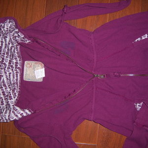 Small hooded zipper sweater is being swapped online for free