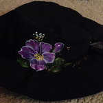 Hand painted black sun hat is being swapped online for free