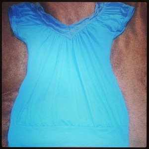 cute teal blouse crochet detail small is being swapped online for free