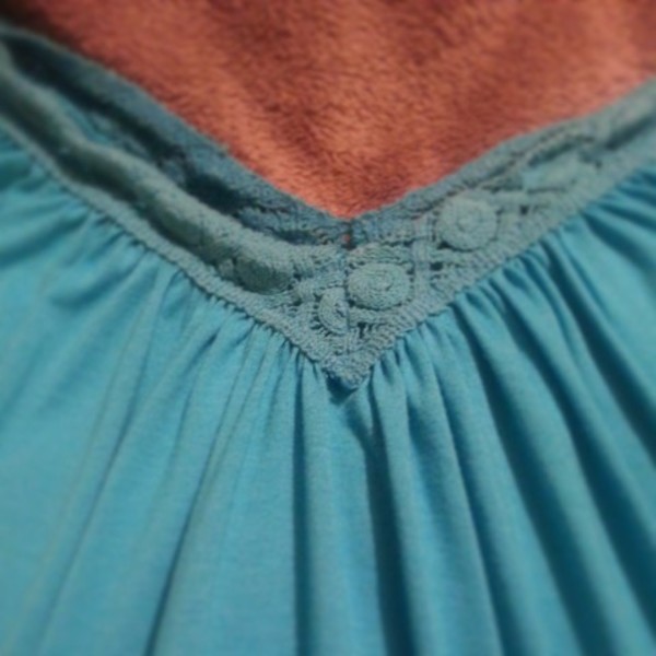 cute teal blouse crochet detail small is being swapped online for free