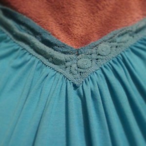 cute teal blouse crochet detail small is being swapped online for free