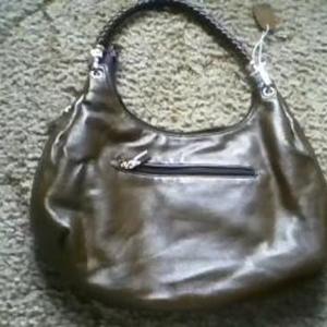 Authentic PRADA Purse is being swapped online for free