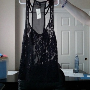 Black floral lace tank medium is being swapped online for free