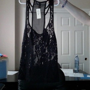Black floral lace tank medium is being swapped online for free