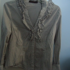 The Limited Grey Stripe Shirt L is being swapped online for free