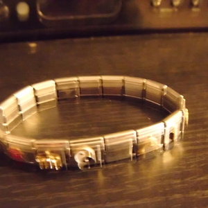 Conecting charm bracelet. is being swapped online for free