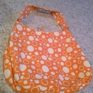 Cute summery reversable orange purse is being swapped online for free