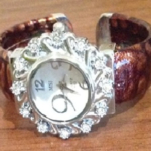 Vintage Jeweled Bangle/ Cuff Watch - One Size. is being swapped online for free