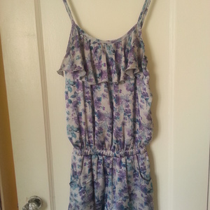Silky flower print romper S is being swapped online for free