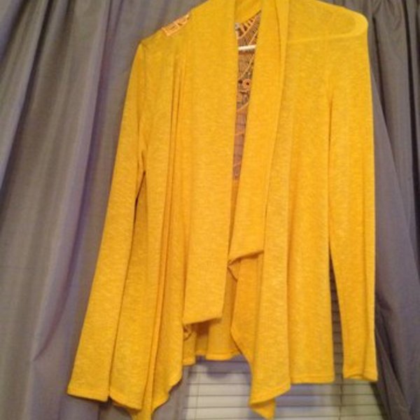 Yellow Cardigan is being swapped online for free