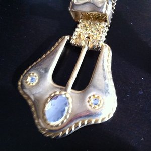 NWOT Gold Glitter Belt is being swapped online for free