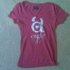 nice hot pink v-neck shirt size: med. (American Eagle) is being swapped online for free