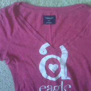 nice hot pink v-neck shirt size: med. (American Eagle) is being swapped online for free