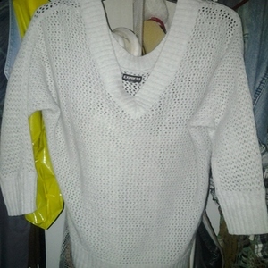 brand new express sweater is being swapped online for free