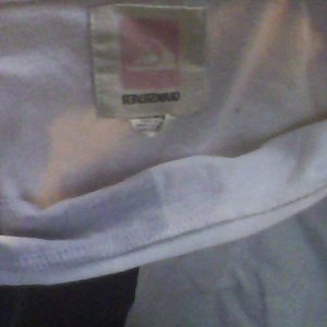 White and Brown Quicksilver Tee is being swapped online for free