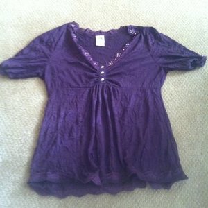 Purple Faded glory shirt large is being swapped online for free