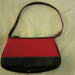red and black purse is being swapped online for free