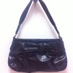 black patent purse / hobo bag is being swapped online for free