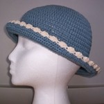 Blue & Cream Knit Bonnet Hat  is being swapped online for free