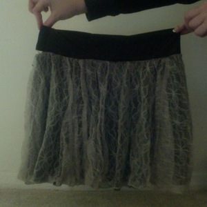 Black/ tan lace mini skirt is being swapped online for free