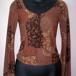 Brown Flowery Top Medium  is being swapped online for free