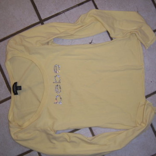 SMALL to Medium BEBE top shirt  is being swapped online for free