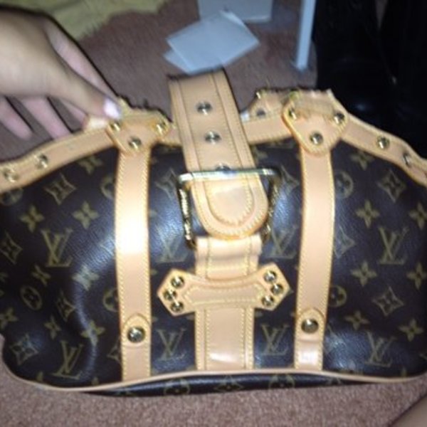 Authentic Louis Vuitton Purse is being swapped online for free