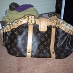 Authentic Louis Vuitton Purse is being swapped online for free