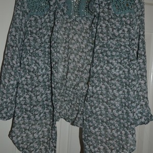 Green Floral Button Up Crop Top is being swapped online for free