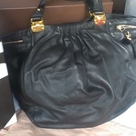 Authentic Miu Miu by Prada *RESERVED* is being swapped online for free