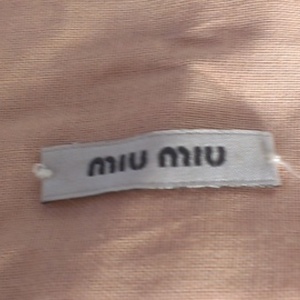 Authentic Miu Miu by Prada *RESERVED* is being swapped online for free