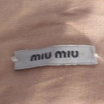 Authentic Miu Miu by Prada *RESERVED* is being swapped online for free