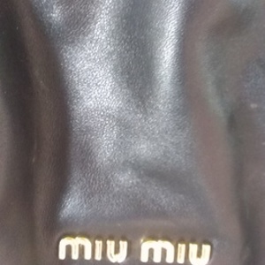 Authentic Miu Miu by Prada *RESERVED* is being swapped online for free