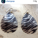 Zebra shell earrings is being swapped online for free