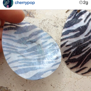 Zebra shell earrings is being swapped online for free