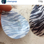 Zebra shell earrings is being swapped online for free