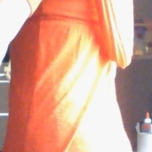 bright orange heathered top is being swapped online for free