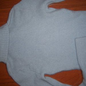 small soft blue sweater DIVIDED H&M is being swapped online for free