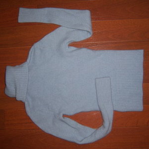 small soft blue sweater DIVIDED H&M is being swapped online for free