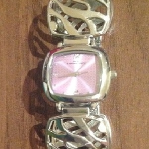 NV London Bracelet/ bangle fashion style watch, silver and pink.  is being swapped online for free