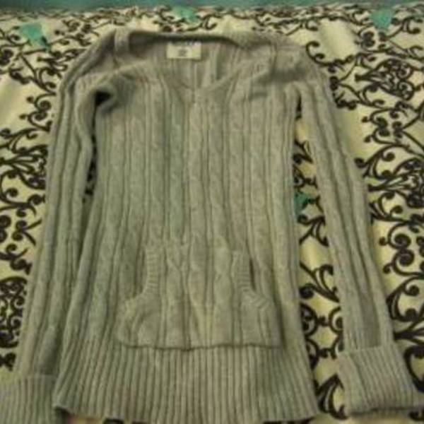 grey sweater is being swapped online for free