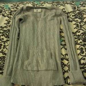 grey sweater is being swapped online for free