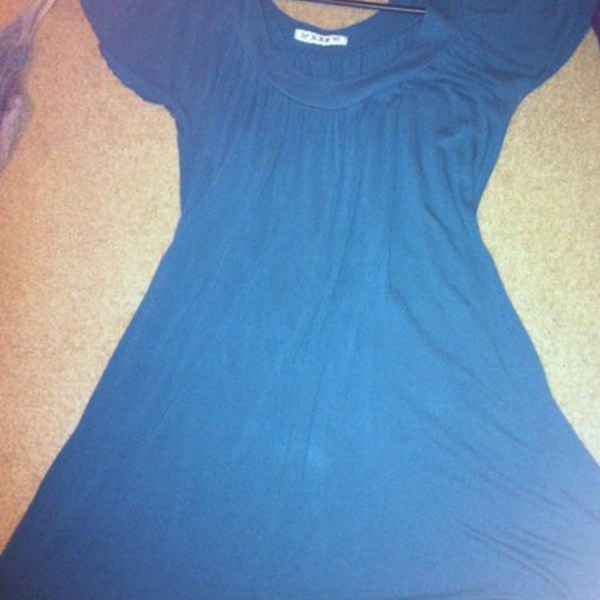 teal tunic is being swapped online for free