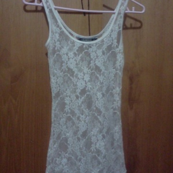 White lace singlet top is being swapped online for free