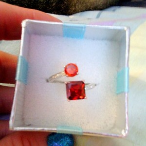 PRETTY RED & ORANGE SILVER RING is being swapped online for free