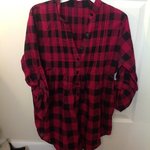 pink & black button up flannel is being swapped online for free
