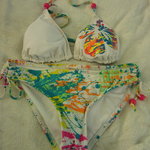 paint splattered bikini is being swapped online for free
