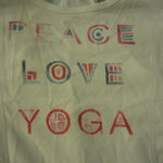 peace love yoga tank is being swapped online for free