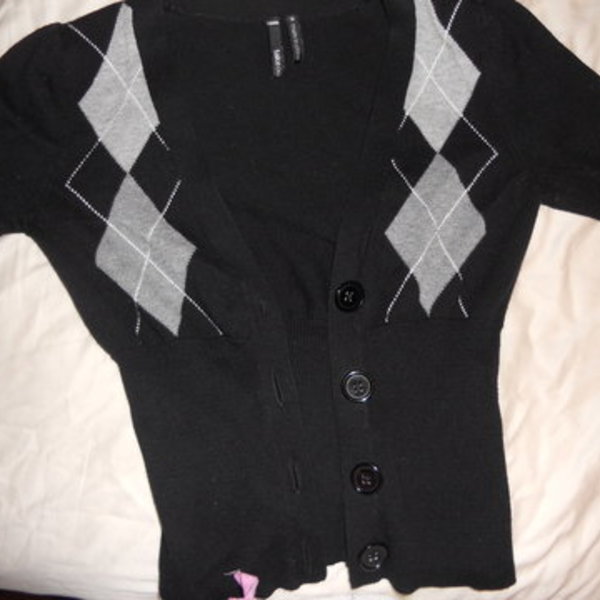 Black Cardigan is being swapped online for free